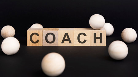 Business and economy concept. On a black surface and wooden cubes with the inscription - questionの写真素材