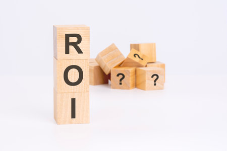 roi text on wooden blocks, business conceptの写真素材