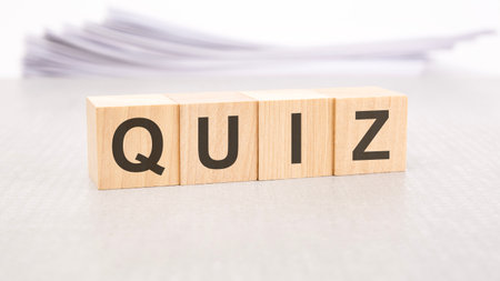 Quiz word written on wood cubes with white backgroundの写真素材