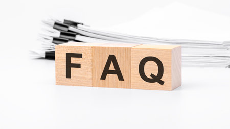 FAQ wooden cubes word on white background. FAQ - frequency asked questions, answers, information conceptsの写真素材