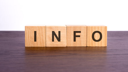 info written in wooden cubes. conceptual word collected of of wooden elements with the letters. stock image, brown backgroundの写真素材