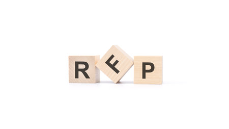 three wooden blocks with the text RFP - an abbreviation for request for proposal. white backgroundの写真素材