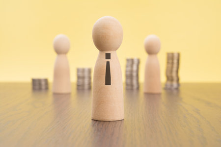 Leadership, Human resource, Manager, Competition concept. Wooden figure on stacking coin on red background, leaders for business successの写真素材