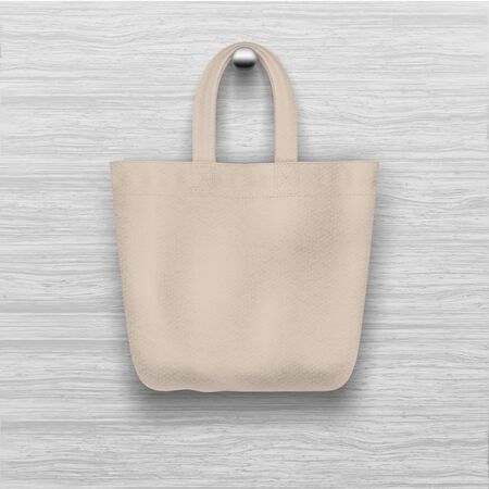 Textile textured beige tote bag hanging on the wooden textured wall. Realistic vector mockup for shopping design.のイラスト素材