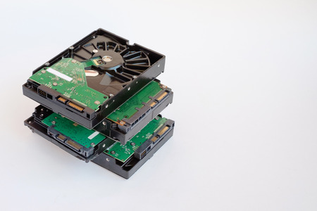 Several Hard drive isolated on a white. HDD diskの写真素材