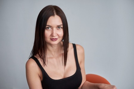 beautiful woman in black dress, close-up portrait