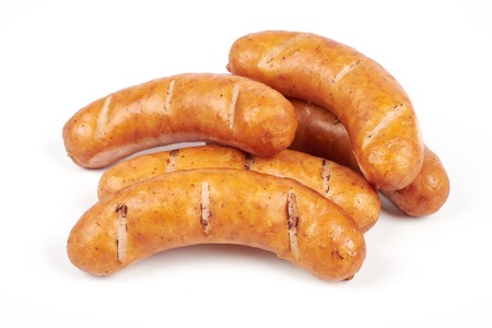 Grilled sausages isolated on a white backgroundの写真素材