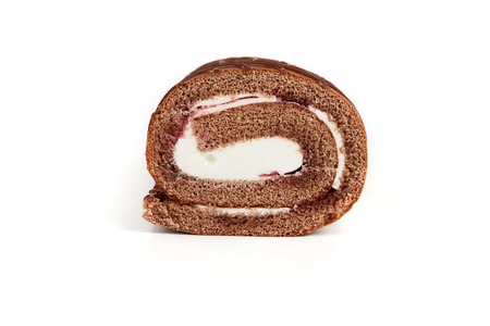 Chocolate biscuit roll cake isolated on white background.の写真素材