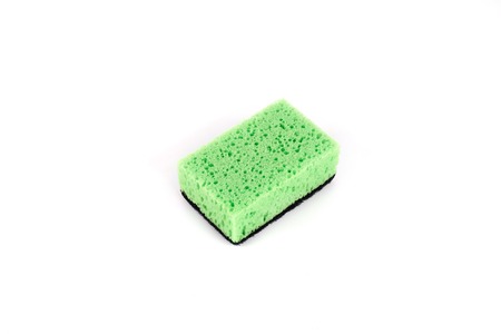 sponge for washing dishes, isolated on white background.の写真素材