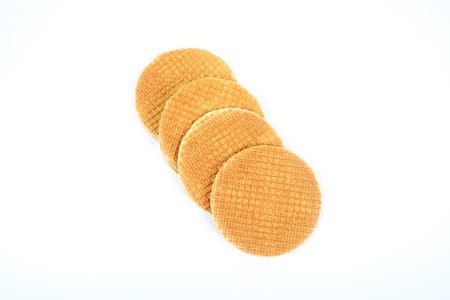Round ruddy waffle isolated on white background.の写真素材