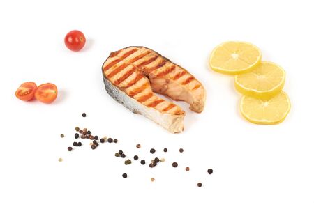 grilled salmon steak fillet, isolated on white backgroundの写真素材