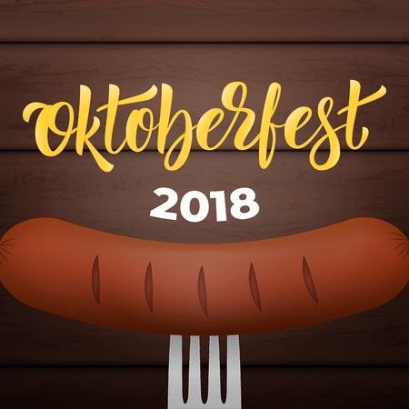 Oktoberfest 2018. Bavarian sausage on the fork, wooden background and trendy Oktoberfest 2018 letteringのイラスト素材