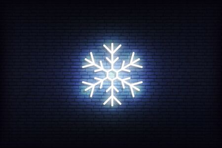 Snowflake neon icon. Glowing Christmas winter holiday icon sign.のイラスト素材