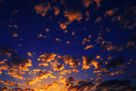 Beautiful dramatic sunrise with clouds in summerの写真素材