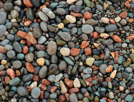 Natural background - multicolored sea pebbles closeup