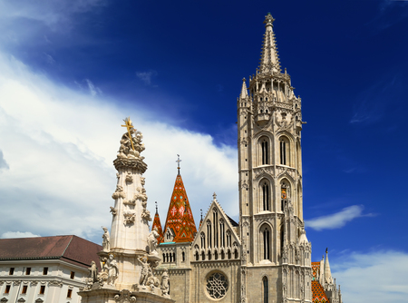 View on the main facade of the Matthias Church and Holy Trinity column located on the square in front of him, in the complex of the Buda castle, Budapest, Hungaryのeditorial素材