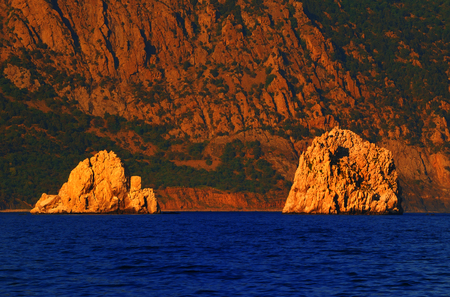 Scenic landscape - rocks Adalary illuminated the sun at sunset, summer, Gurzuf, Crimeaの写真素材
