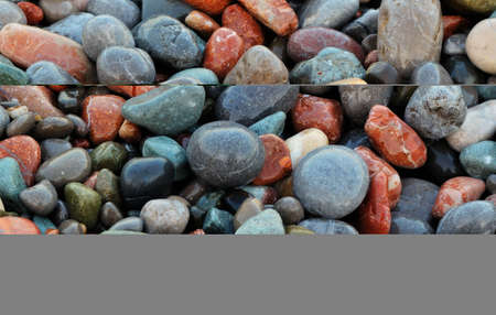 Natural background - multicolored sea pebbles closeupの写真素材