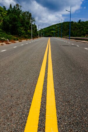 Mountain road. Summer time. Background, travel, landscape. Highway in the mountains. Good asphalt...