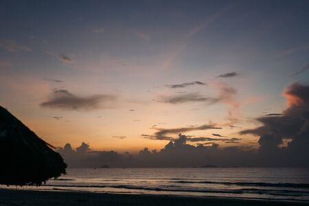 Beautiful sunrise, sunset of the sun through the clouds, the rays of the sun through the clouds,...
