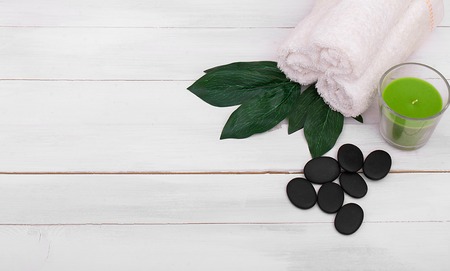 Beautiful composition of spa treatment on white wooden table.の写真素材