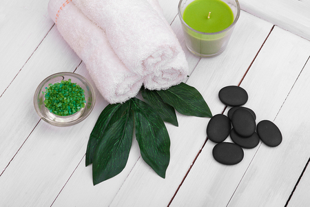 Beautiful composition of spa treatment on white wooden table.の写真素材