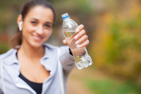 Runner drink water. Fitness, sport and healthy lifestyle conceptの写真素材