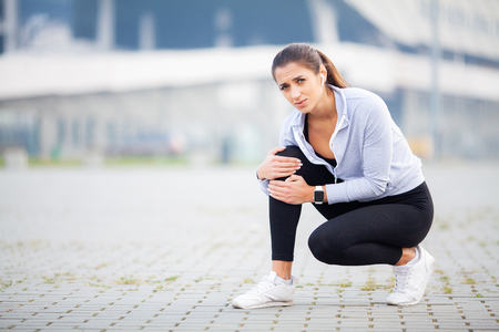Leg Injury. Woman Suffering From Pain In Leg After Workoutの写真素材