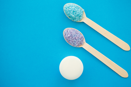Spa Accessories. Bath Salt Beauty Treatment on Blue Backgroundの写真素材