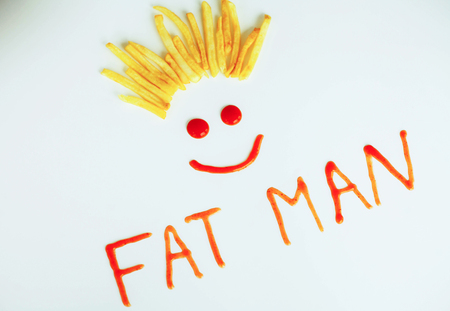 Diet. Funny Face. Golden Frost Potato on White Background. Dietoの写真素材