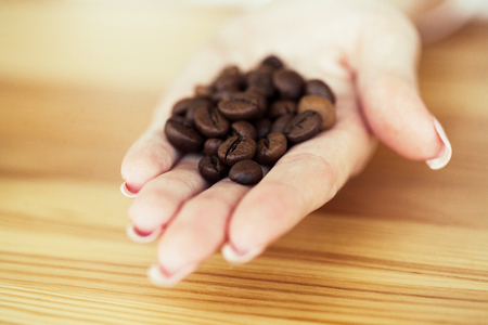 Good Morning. Coffee To Go. Coffee Cups With Cover and Coffee Beans on Wooden Table Backoundの写真素材