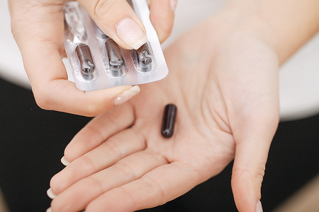 Acceptance of drugs. Self-treatment at home. Pills prescribed by your doctor.の写真素材