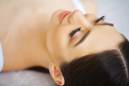 Beauty concept. Eyelash extension processの写真素材