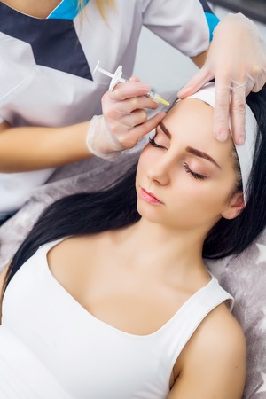 Body Care. Cute girl receiving hyaluronic acid treatmentの写真素材