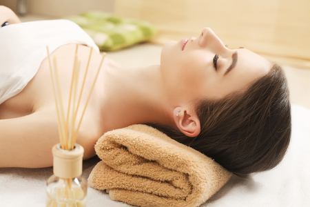 Young, beautiful and healthy woman in spa salonの写真素材