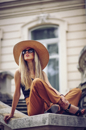 Noise. Vintage Style. Woman portrait in Lviv, Ukraine. Happy candid travel tourist girl on city center, the old town of Lviv, Ukraine.の写真素材