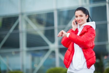 Fitness Woman have break, talking on phone - Sport and healthy lifestyle conceptの写真素材