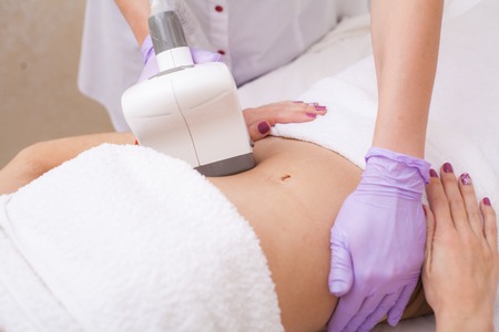 Body Care. Woman is in the process at the clinic lipomassageの写真素材