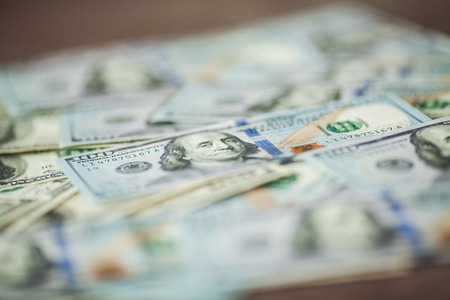 American money background texture bills of 100 american dollars.