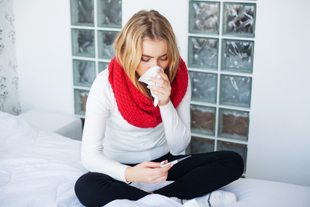 Flu. Woman Suffering From Cold Lying In Bedの写真素材
