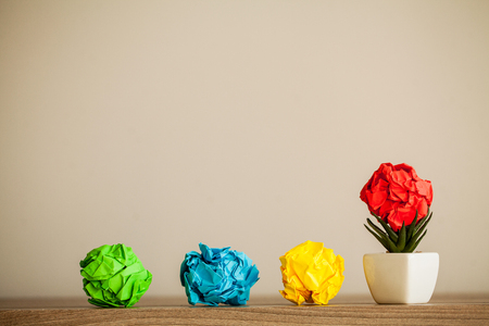 Creative idea concept. Crumpled paper balls on wood backgroundの写真素材