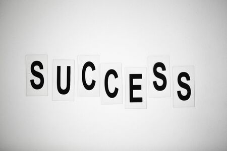 Success word written on white table. Copy spaceの写真素材