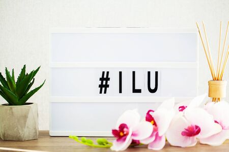 Led letter board with hashtag word on table.の写真素材