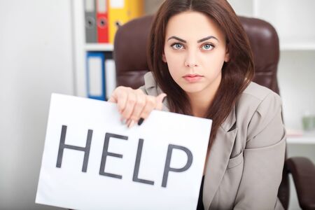 You need help ? The beautiful business woman at office asks of the helpの写真素材