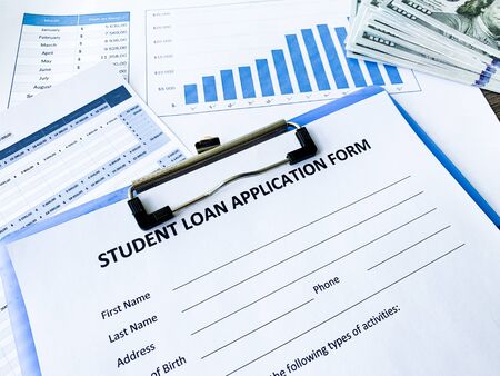 Student loan application form document on tableの写真素材