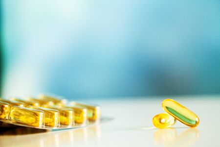 Omega 3 fish oil yellow soft gel capsules.の写真素材