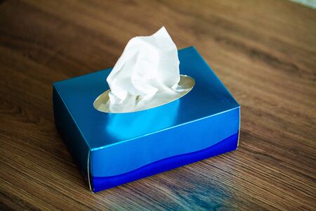 Box hygiene napkins on the brown deskの写真素材