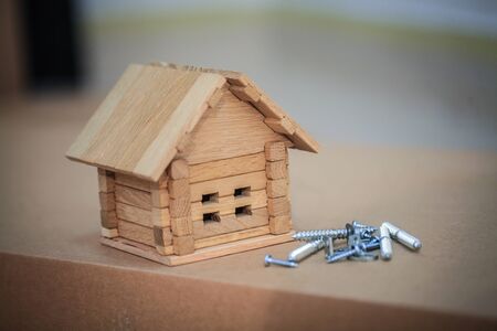 Building new home. Close up of house blueprint with building toolsの写真素材