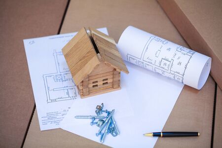 Build new house. House on blueprints - housing projectの写真素材