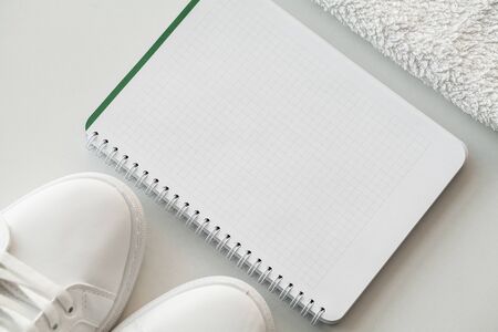 Stylish white fashion sneakers on white background.の写真素材